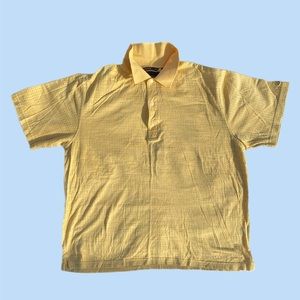 Greg Norman polo shirt.